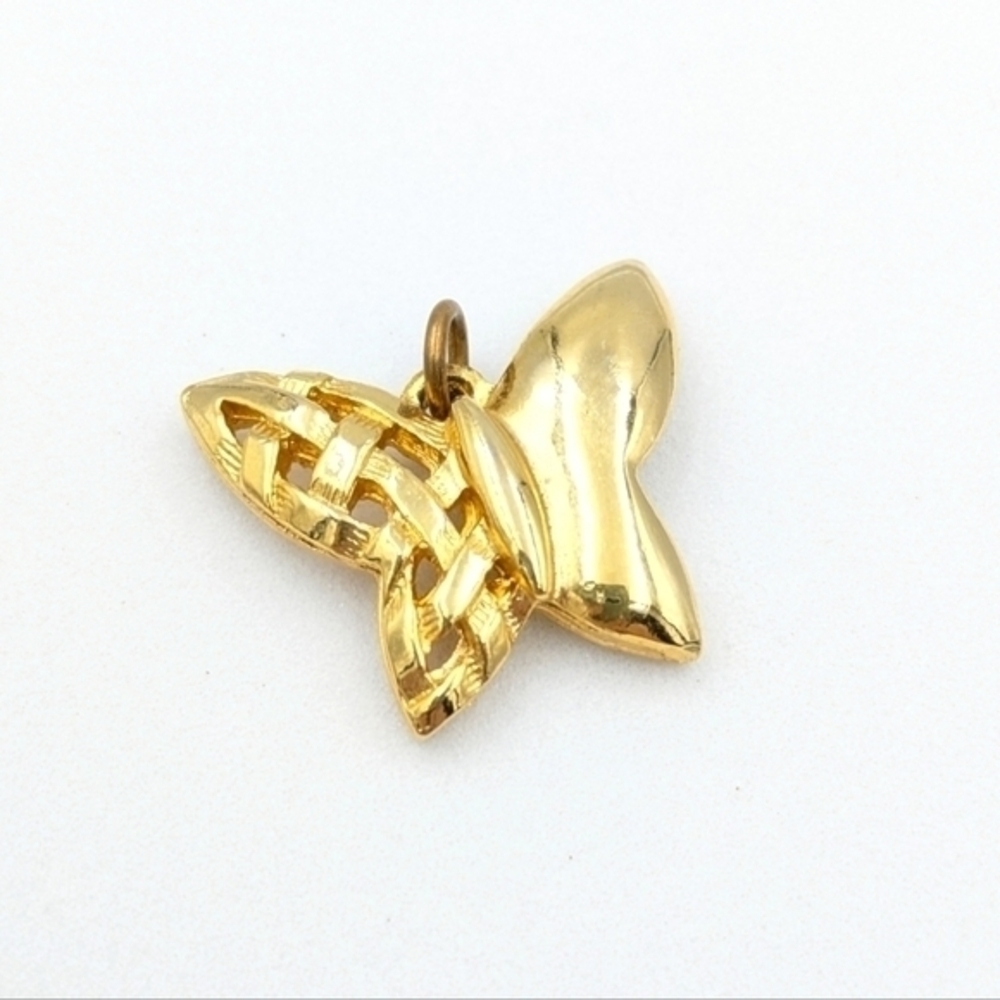 5/25$   Butterfly gold tone multi texture pendant